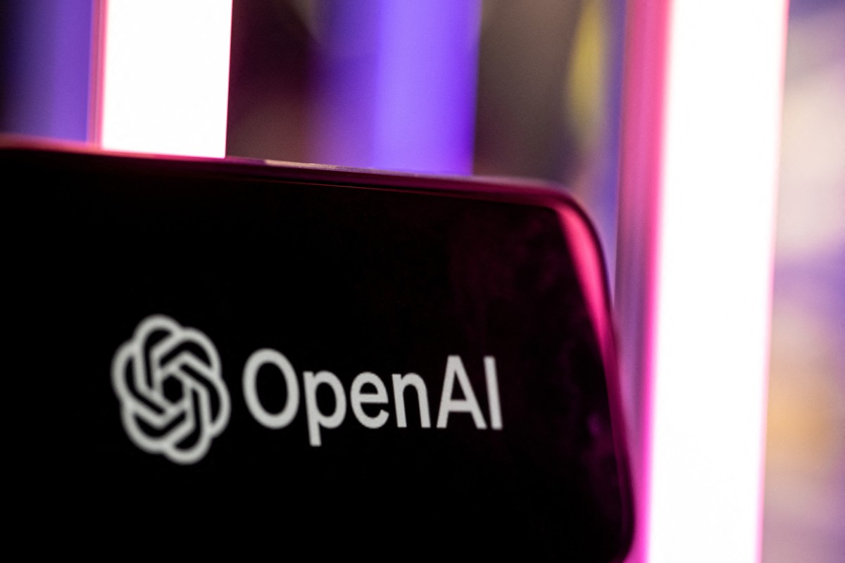 The OpenAI logo is seen at the 