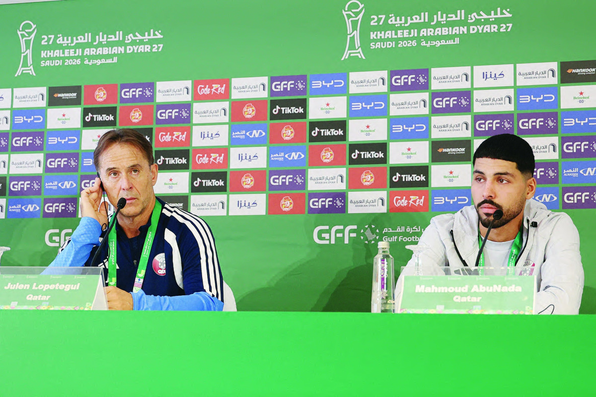 Qatar coach Julen Lopetegui (left) and Qatar goalkeeper Mahmoud Abunada speak during a press conference ahead of their Gulf Cup opener against defending champions Bahrain in Jeddah yesterday.