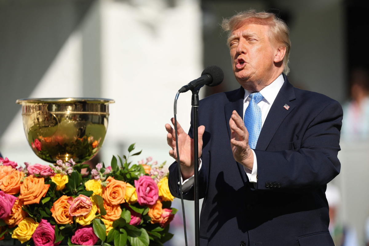 President Donald Trump speaks to the crowd on the first tee during Sunday's Singles on day four of the Presidents Cup 2026 at Medinah Country Club on September 27, 2026 in Medinah, Illinois. (Photo by Sarah Stier / GETTY IMAGES NORTH AMERICA / Getty Images via AFP)