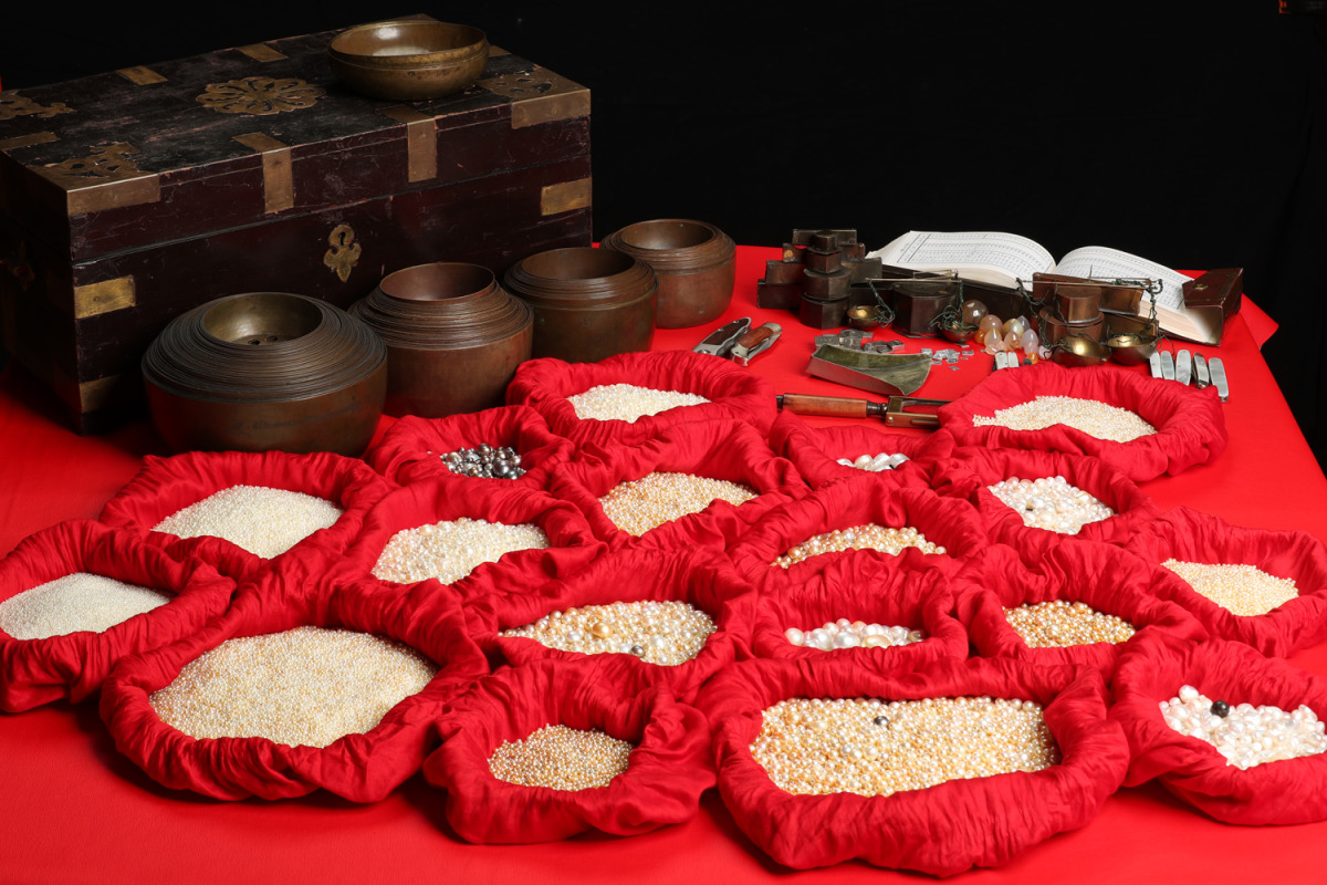 Various types of pearls on display.