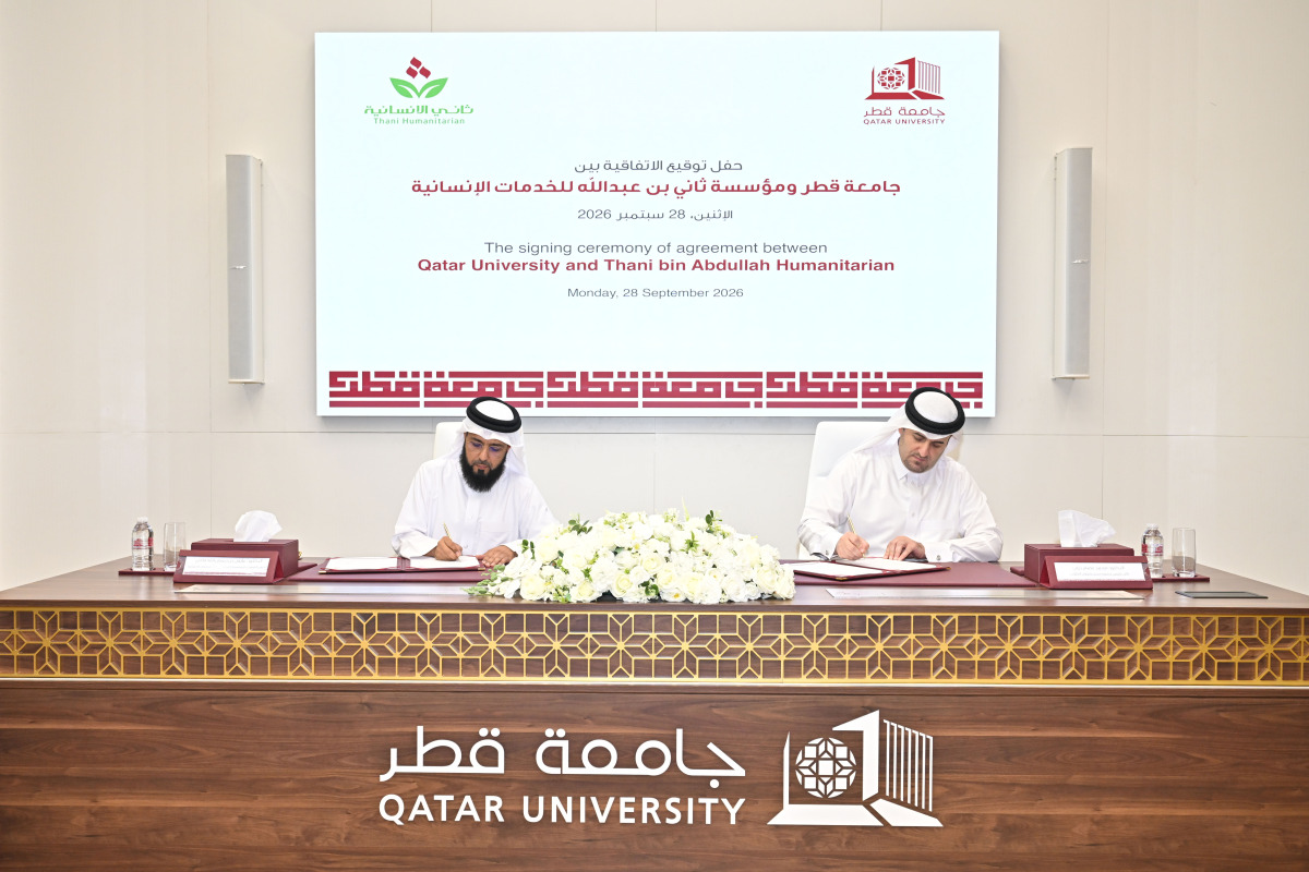 CEO of Thani Bin Abdullah Foundation for Humanitarian Services Dr. Ayed bin Dabsan Al-Qahtani and Vice President for Student Affairs at QU Dr. Mohammad Diab signing the agreement.
