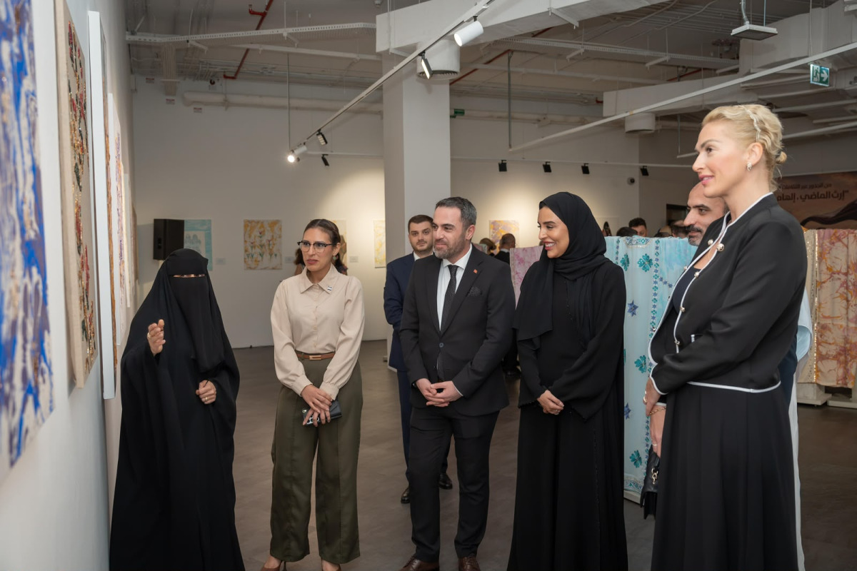 Officials and visitors during the exhibition.