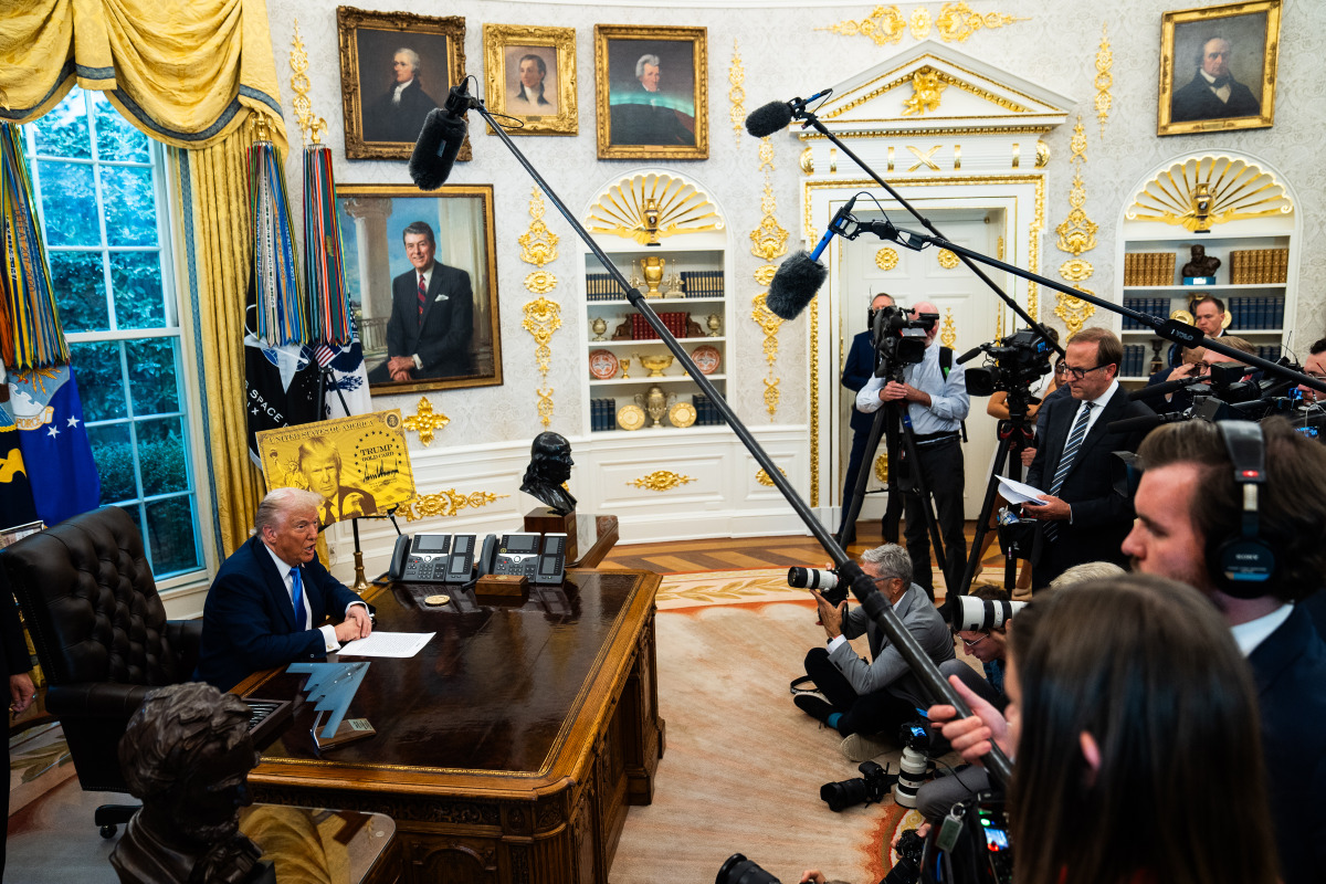 Trump in the gilded Oval Office. (Demetrius Freeman/The Washington Post)
