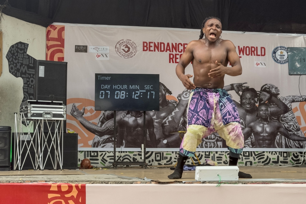 Nigerian dancer Benjamin Daniel Gabriel, 32, dances on stage to set a new world record for the longest individual dance marathon in Lagos on September 29, 2026. (Photo by Tonye Bakare / AFP)