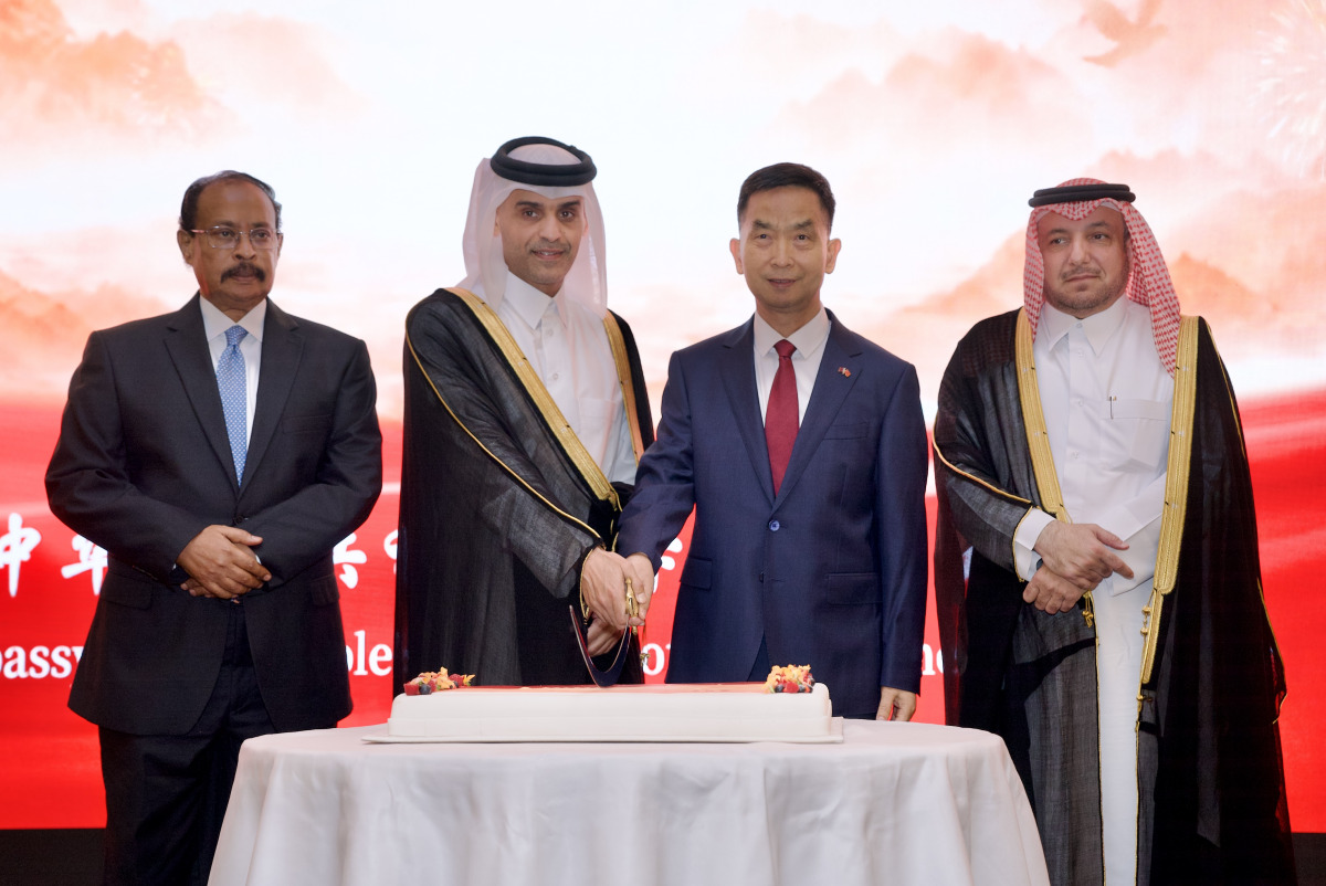 Minister of Transport H E Sheikh Mohammed bin Abdulla bin Mohammed Al Thani (second left) with Ambassador of China H E Cao Xiaolin (second right), Director of Department of Protocol at the Ministry of Foreign Affairs H E Ibrahim Yousif Abdullah Fakhro (right) and Dean of the Diplomatic Corps in Qatar and Ambassador of Eritrea H E Ali Ibrahim Ahmed at the event yesterday.  PIC: Ahmed Barakat/The Peninsula