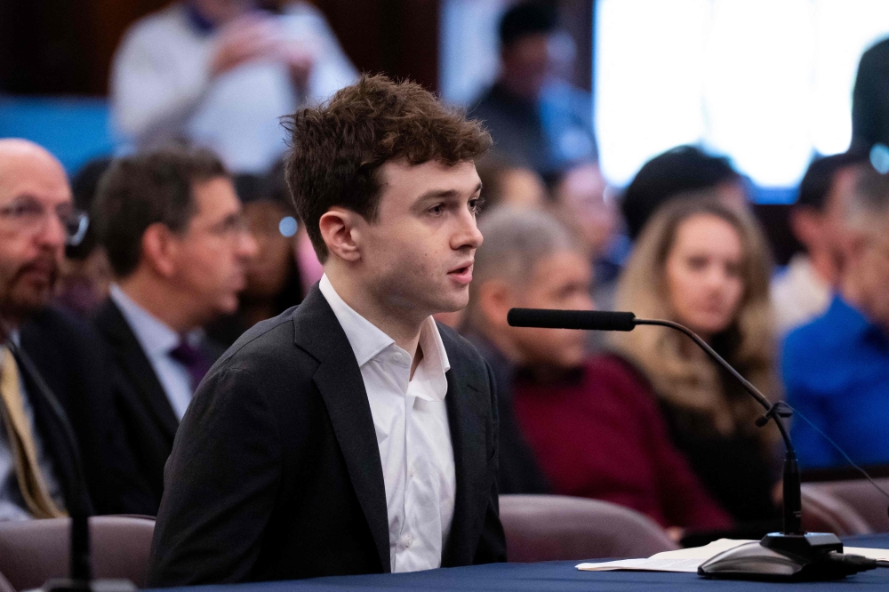 Former Anthropic researcher Jacob Coxon testifies during a New York City Council Committee hearing on the risks and regulation of artificial intelligence at City Hall on October 5, 2026, in New York City. Adam Gray/Getty Images/AFP
