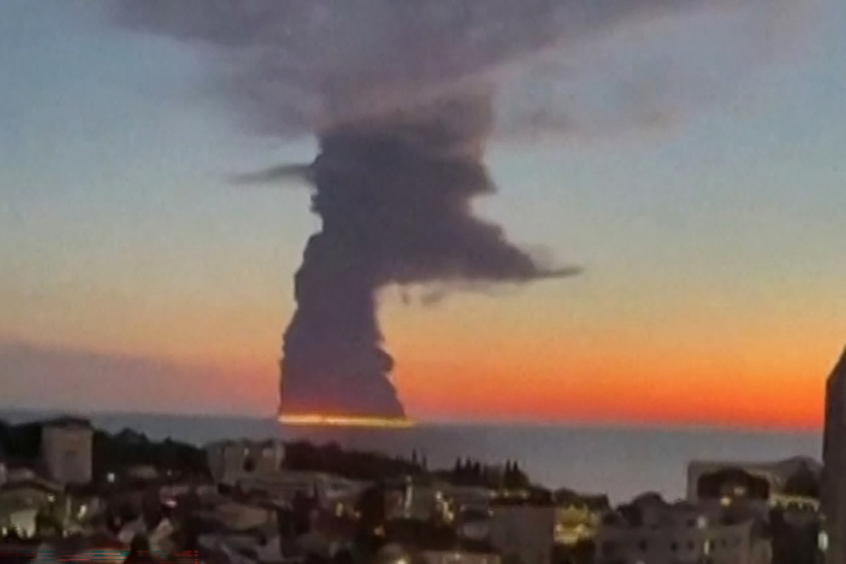 This screen grab taken from an UGC obtained by AFPTV on October 6, 2026, shows a fire on a vessel believed to be an oil tanker at the Russian city of Sochi on the Black Sea, amid the Russian invasion of Ukraine. (Photo by -UGC / UGC / AFP)