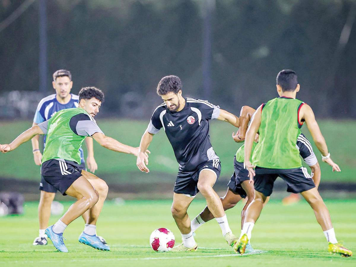 Al Shamal players in action during a training session.
