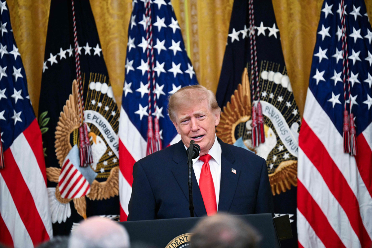 US President Donald Trump speaks during a Columbus Day celebration in the East Room of the White House in Washington, DC, on October 9, 2026. (Photo by Alex WROBLEWSKI / AFP)
