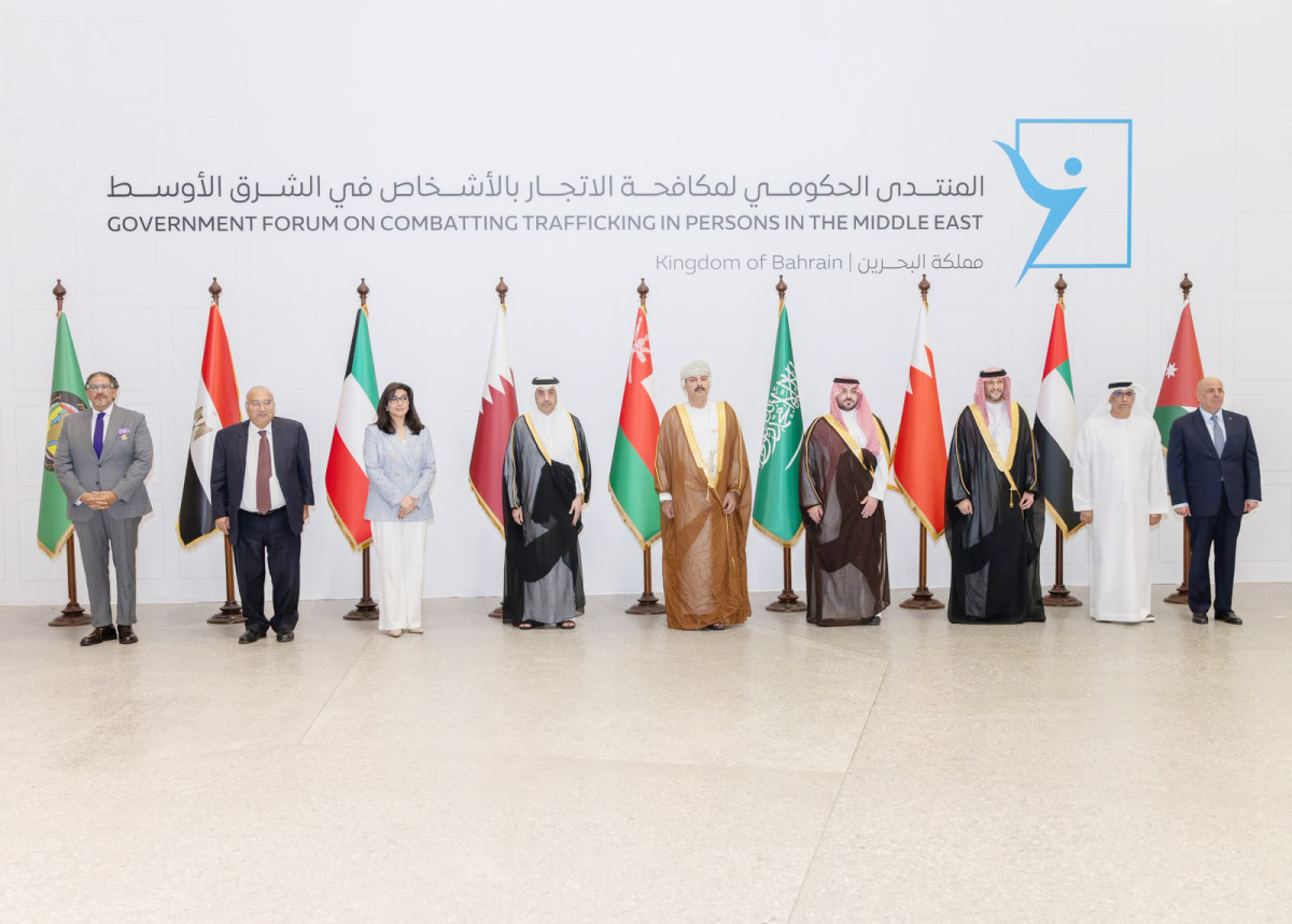 Minister of Labour and Chair of the National Committee for Combating Human Trafficking H E Dr. Ali bin Smaikh Al Marri with other officials during the forum.