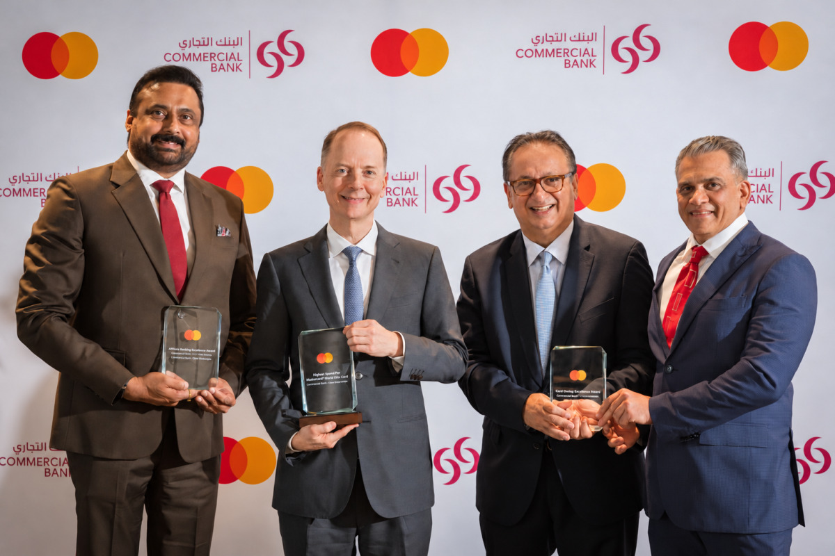 Group CEO of Commercial Bank Stephen Moss with other senior officials with the awards.