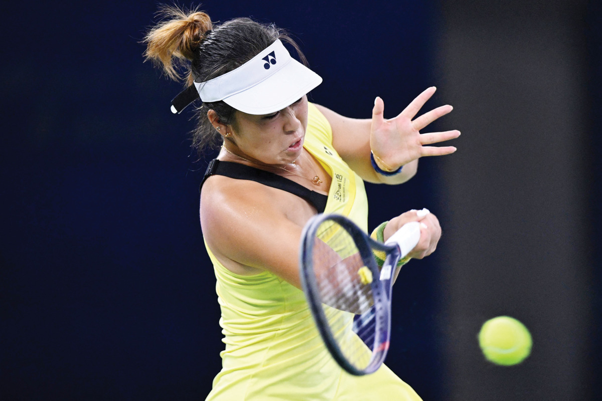 China’s Shi Han hits a return to Philippines’ Alexandra Eala.