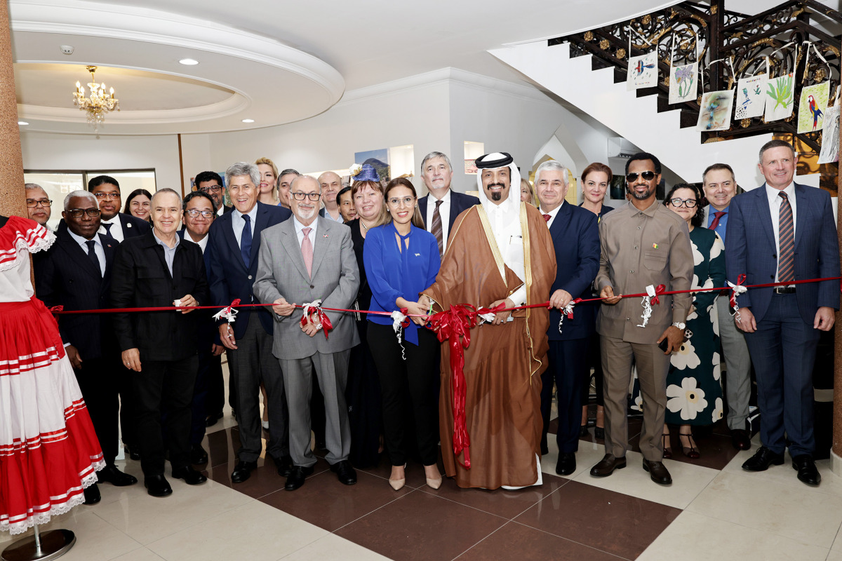 Head of Mission at the Embassy of Honduras H E Sophia Escobar Lanza (centre); and  AFCD Founder and Patron Farhan Al Sheikh Al Sayed with ambassadors and diplomats inaugurating the ninth edition of the Art, Fashion and Cultural Diplomacy exhibition, yesterday. Pic: Salim Matramkot/THE PENINSULA 