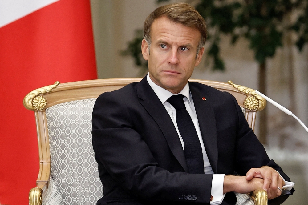 France's President Emmanuel Macron attends a meeting with the UAE president at Qasr al-Watan presidential palace in Abu Dhabi on October 19, 2026. (Photo by Benoit Tessier / POOL / AFP)