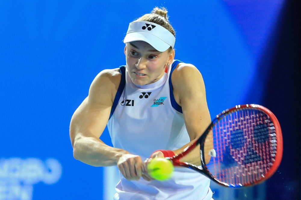 Kazakhstan's Elena Rybakina hits a return to Russia's Diana Shnaider during their women's singles semifinal match at the Ningbo Open tennis tournament in Ningbo, China's eastern Zhejiang province on October 24, 2026. (Photo by CN-STR / AFP) 
