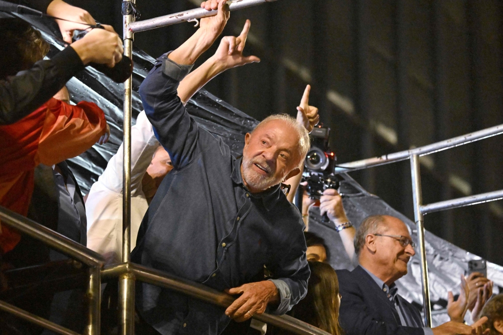 Brazil's President and presidential candidate Luiz Inacio Lula da Silva gestures to supporters after winning the presidential runoff election in Sao Paulo, Brazil, on October 25, 2026. (Photo by Juan Barreto / AFP)