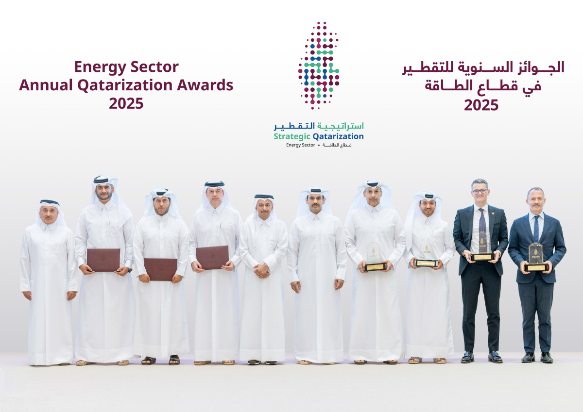 Minister of State for Energy Affairs H E Saad Sherida Al-Kaabi poses for a group photo with senior executives.