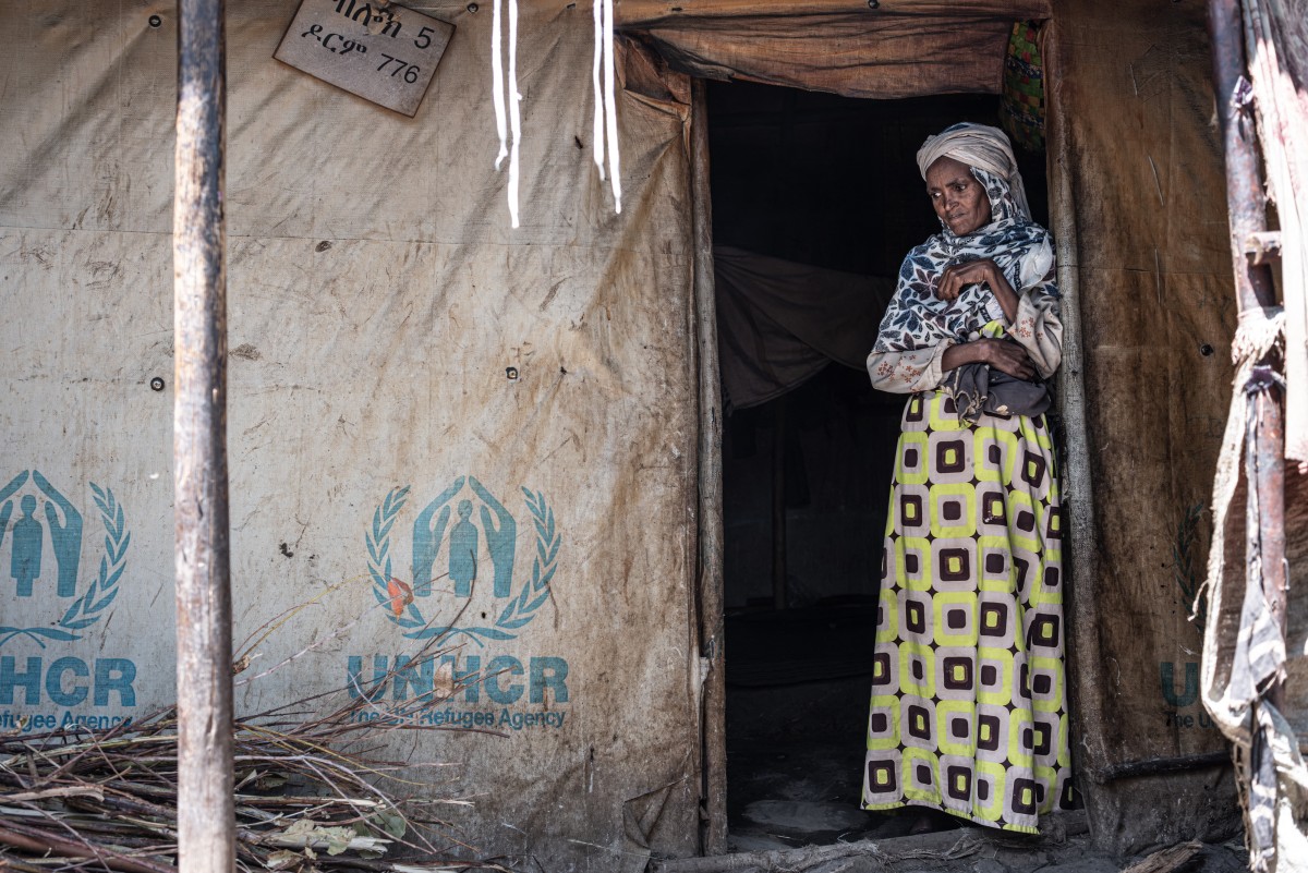 Representational photo showing a displaced Amhara woman stands at the entrance of her tent at the crowded Bakelo Camp for internally displaced people in Debre Berhan, on October 19, 2026. (Photo by Marco Simoncelli / AFP)
