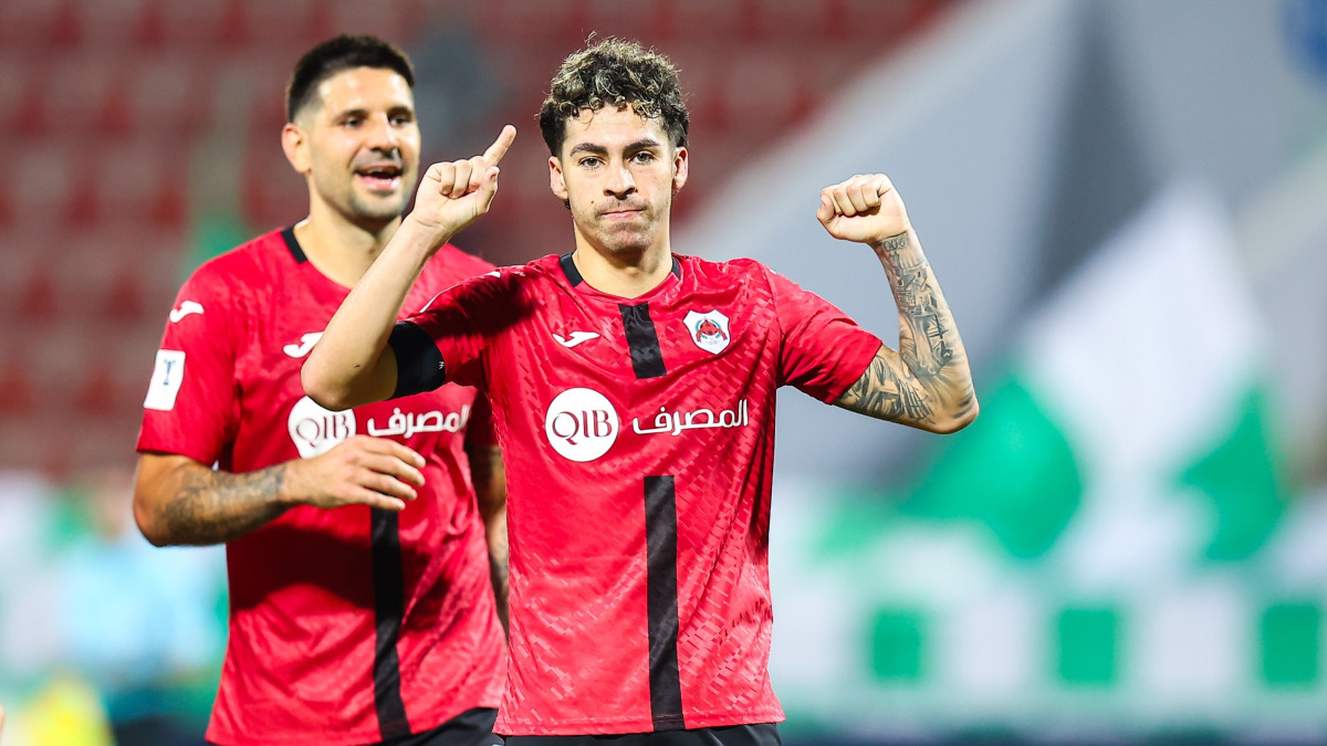 Gabriel Pereira (right) celebrates after scoring Al Rayyan's third goal. 