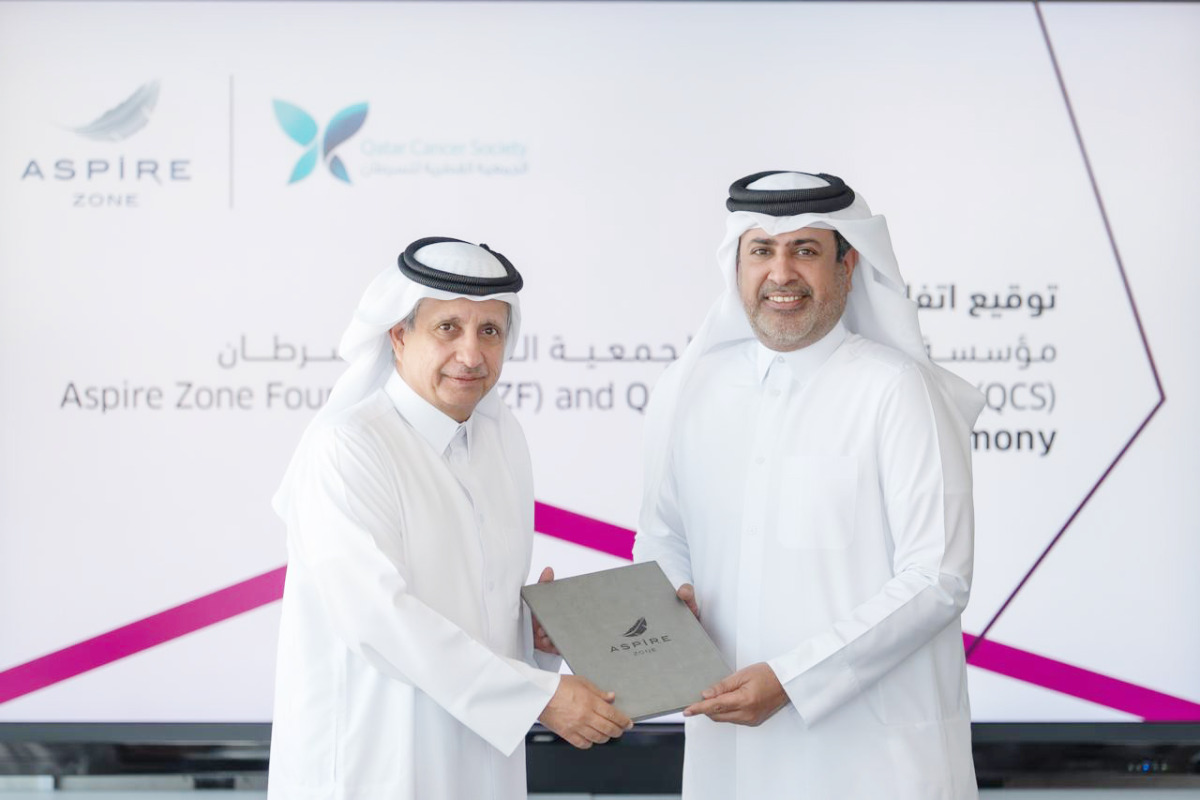 Chairman of Qatar Cancer Society H E Sheikh Dr. Khalid bin Jabor Al Thani with Acting Chief Executive Officer of Aspire Zone Foundation Abdulla Nasser Al-Naemi during the signing ceremony.