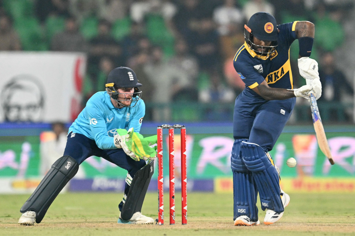Sri Lanka's Avishka Fernando (R) plays a shot during the one-day international (ODI) tri-series cricket match between England and Sri Lanka at the Gaddafi stadium in Lahore on October 29, 2026. (Photo by ARIF ALI / AFP)
