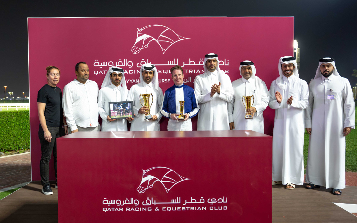 QREC Chairman Hamad bin Abdulrahman Al-Attiyah presented the QA Gr3 Barzan Cup trophy to the connections of Dumonet. PICS: JUHAIM/QREC